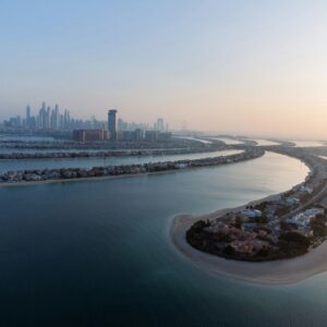 Aerial view of Palm Jumeirah and the Palm Tower where The View at The Palm observation deck is located, Dubai