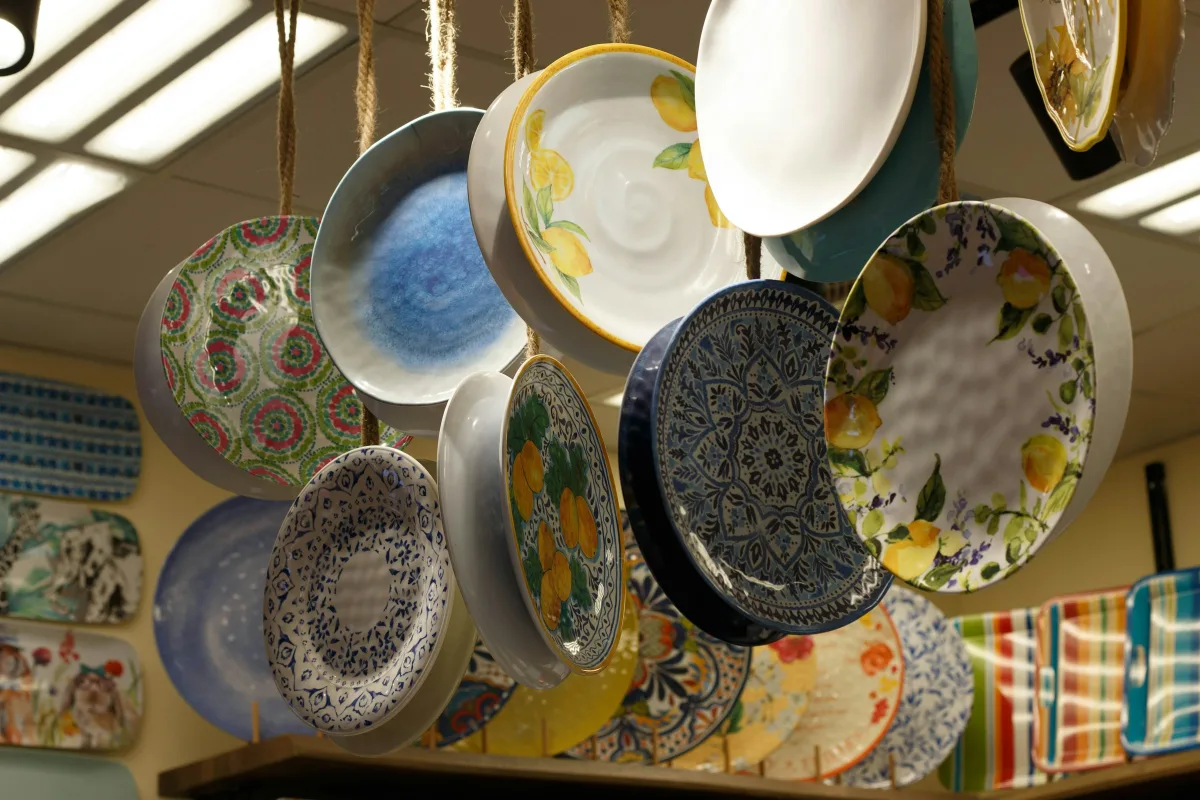 Plates of street food on a table at a Global Village food stall